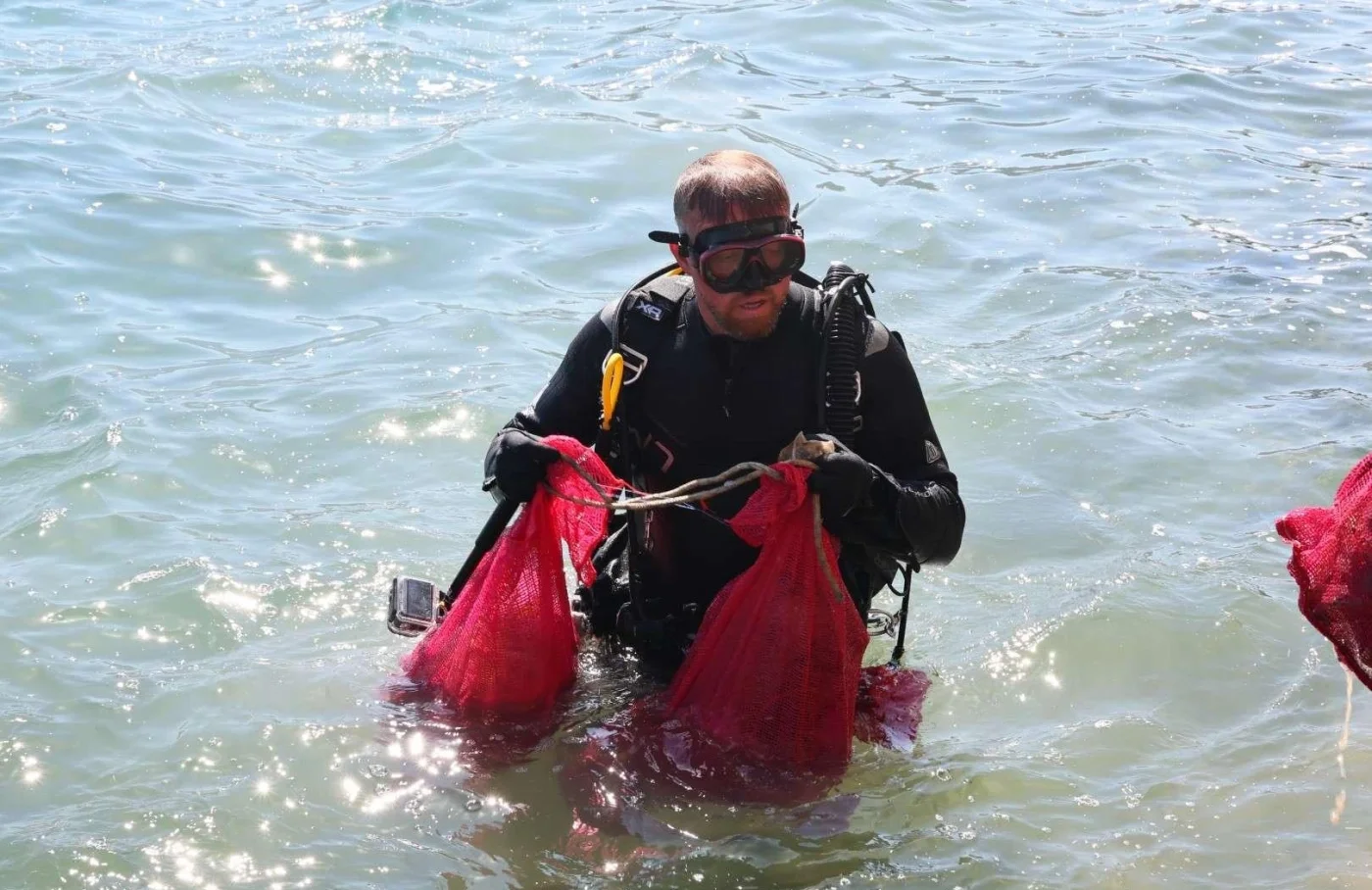Torba’da denizden 75 kilogram atık çıkarıldı